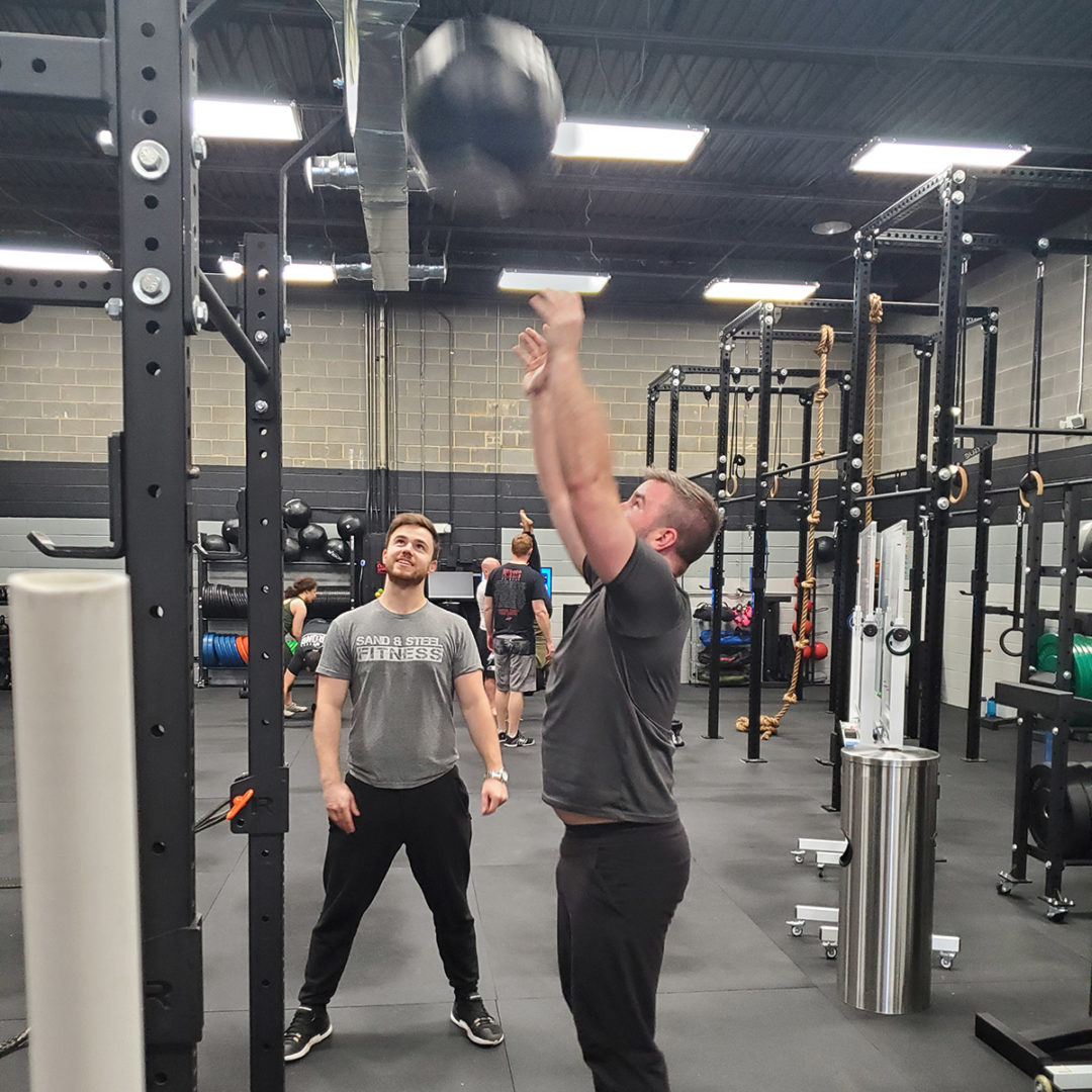 Shoulder Taps CrossFit Gymnastics WOD Sand and Steel Fitness